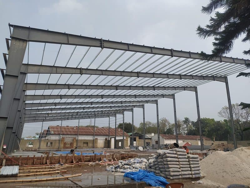 Steel portal frames on site